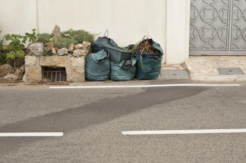Person using a screen reader and keyboard to access waste removal information